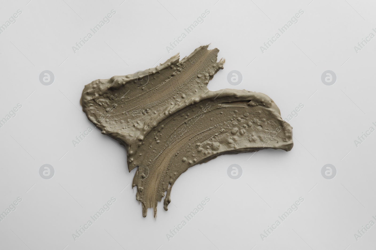 Photo of Sample of facial mask isolated on white, top view