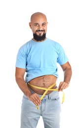 Overweight man with measuring tape on white background