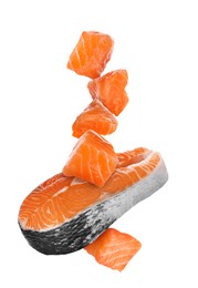 Cut fresh salmon falling on white background