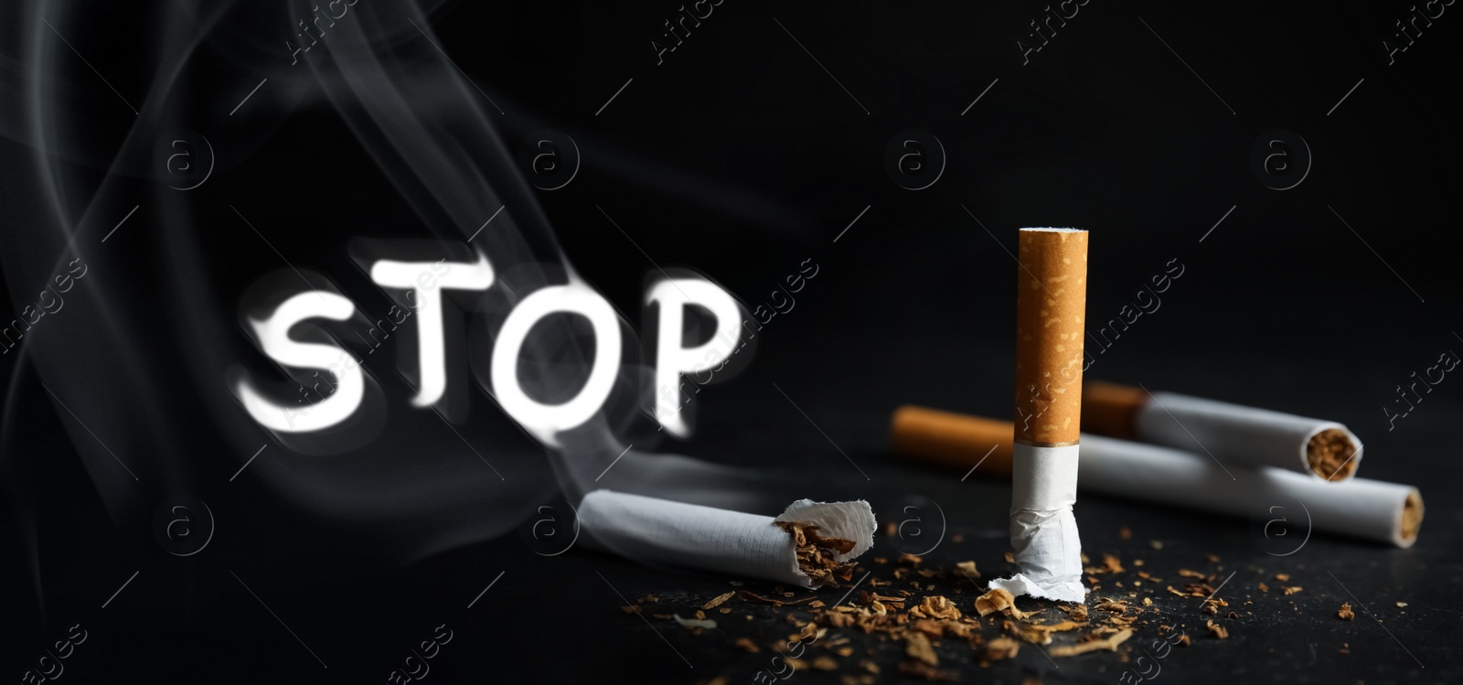 Image of Quit smoking. Word Stop of smoke, whole and broken cigarettes on black background, banner design