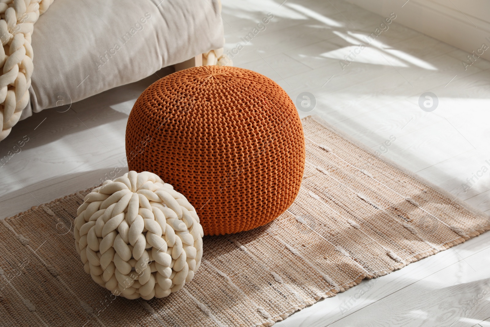 Photo of Stylish comfortable poufs in room, space for text