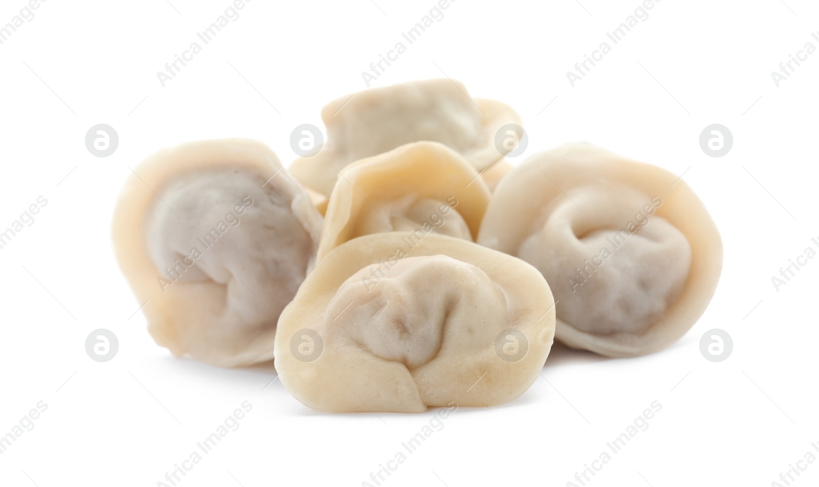 Photo of Pile of boiled dumplings on white background