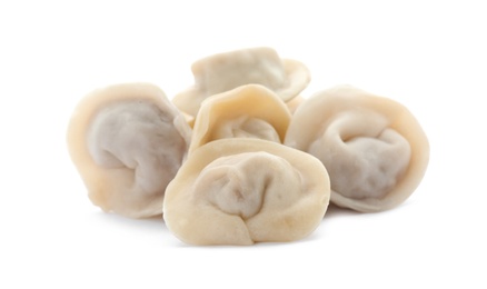 Photo of Pile of boiled dumplings on white background