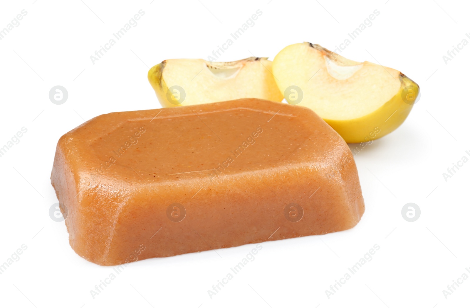 Photo of Delicious sweet quince paste and fresh cut fruit isolated on white