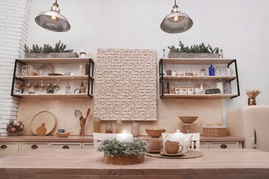 Photo of Kitchen interior with festive decor. Christmas celebration