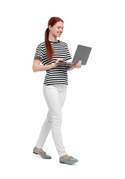 Happy woman using laptop on white background
