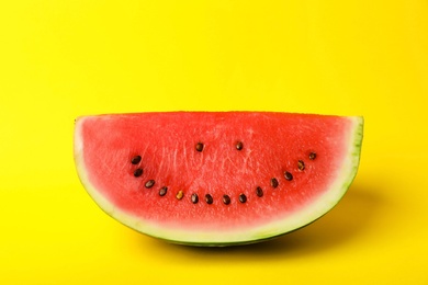 Photo of Watermelon with funny smiling face on color background