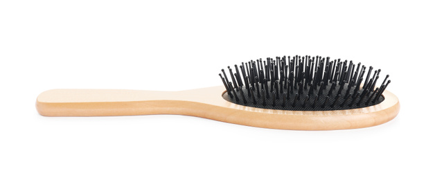 New wooden hair brush isolated on white