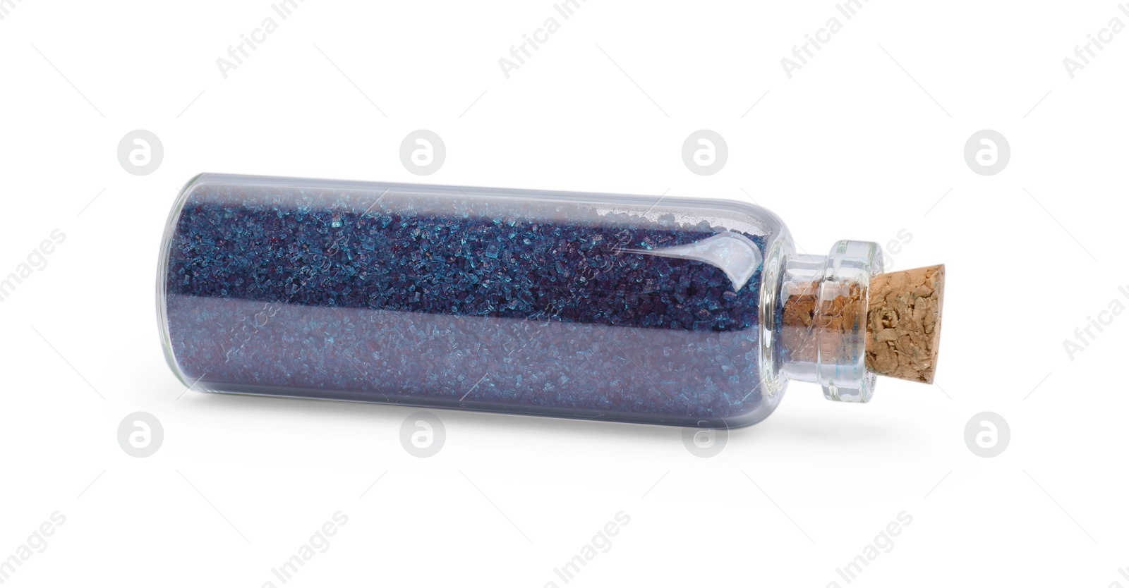 Photo of Glass bottle of blue food coloring isolated on white