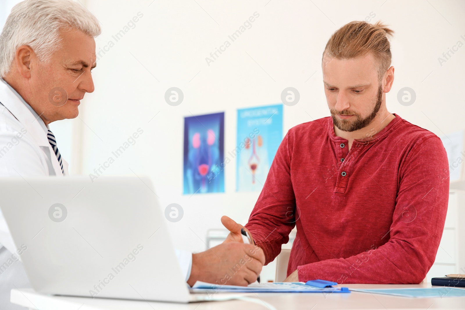 Photo of Man with health problems visiting urologist at hospital