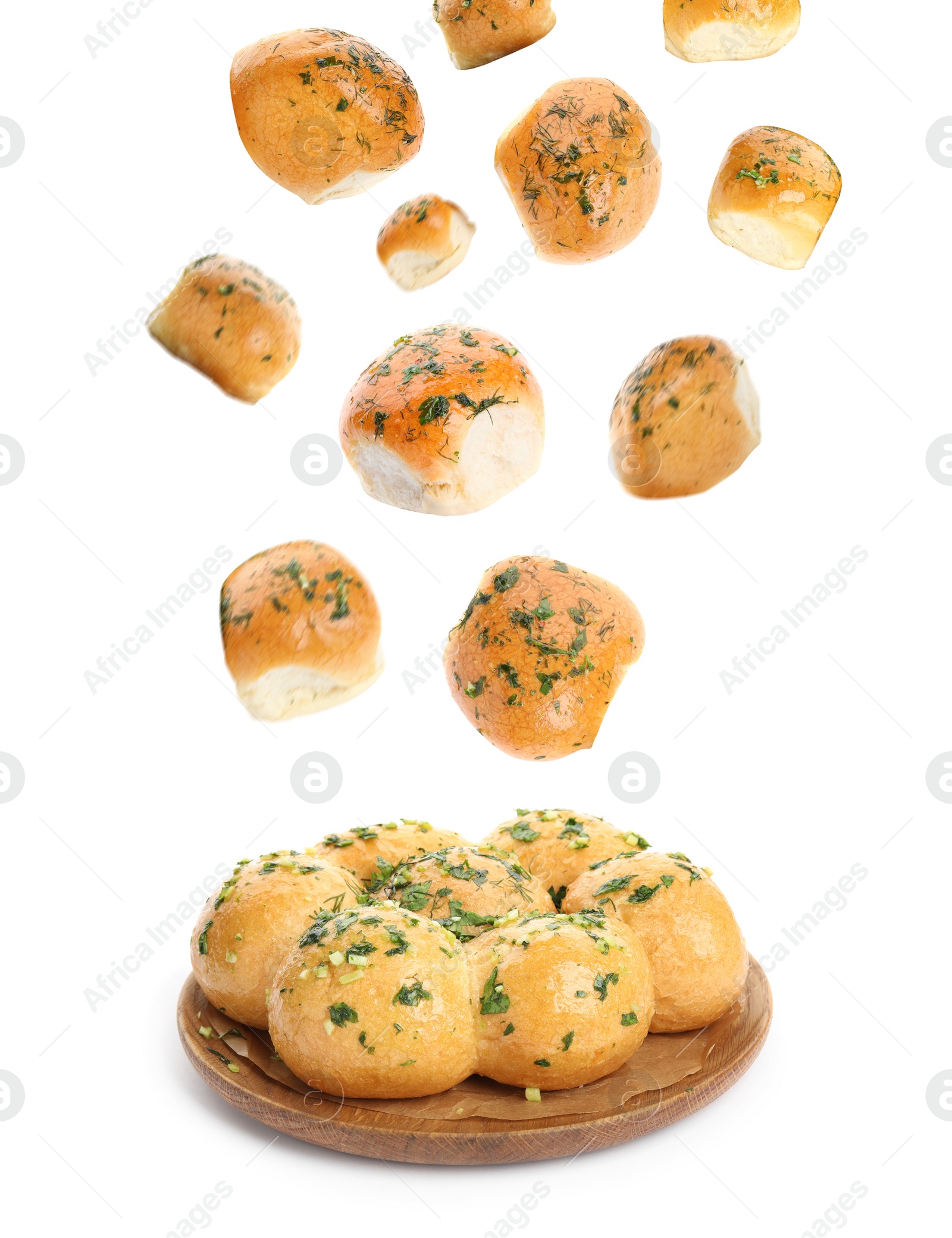 Image of Traditional Ukrainian buns (Pampushky) falling on white background