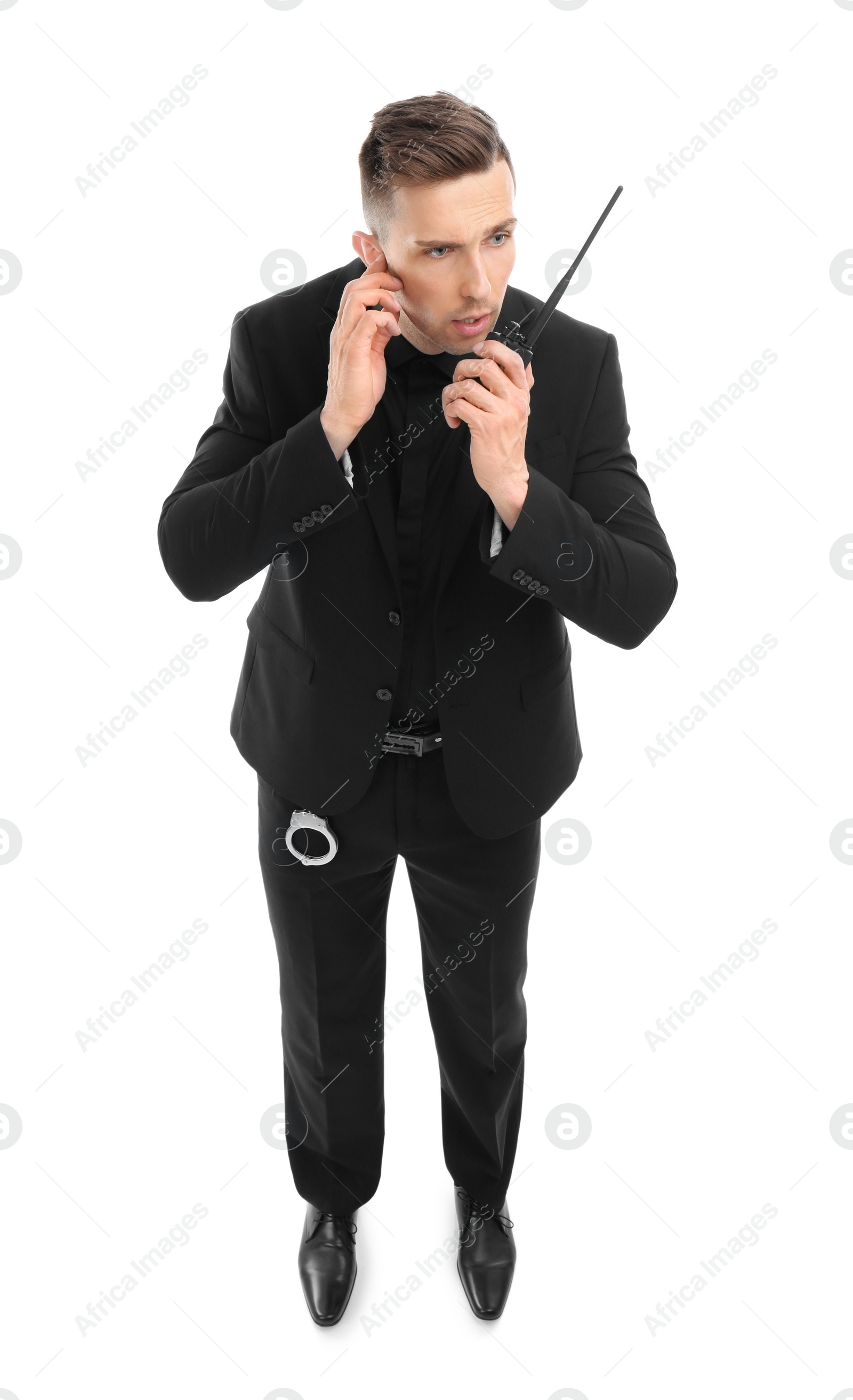 Photo of Male security guard using portable radio transmitter on white background