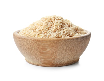 Photo of Bowl with uncooked brown rice on white background