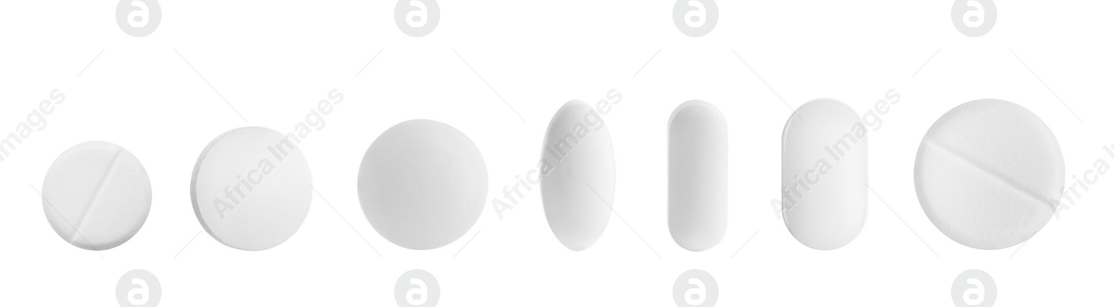 Image of Set of different pills in row isolated on white