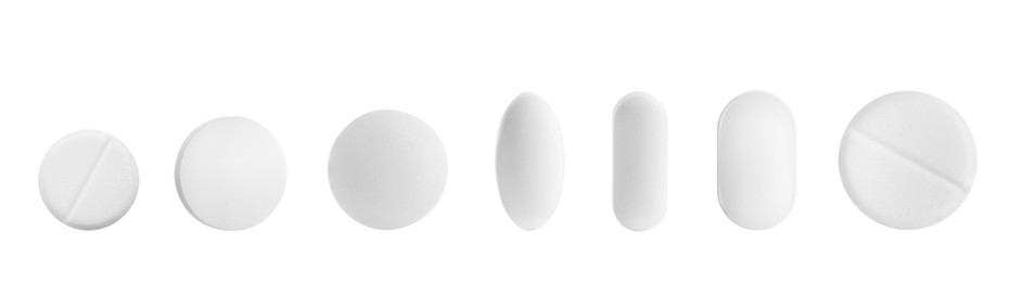 Image of Set of different pills in row isolated on white