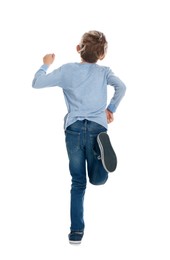 Photo of Little boy running on white background, back view