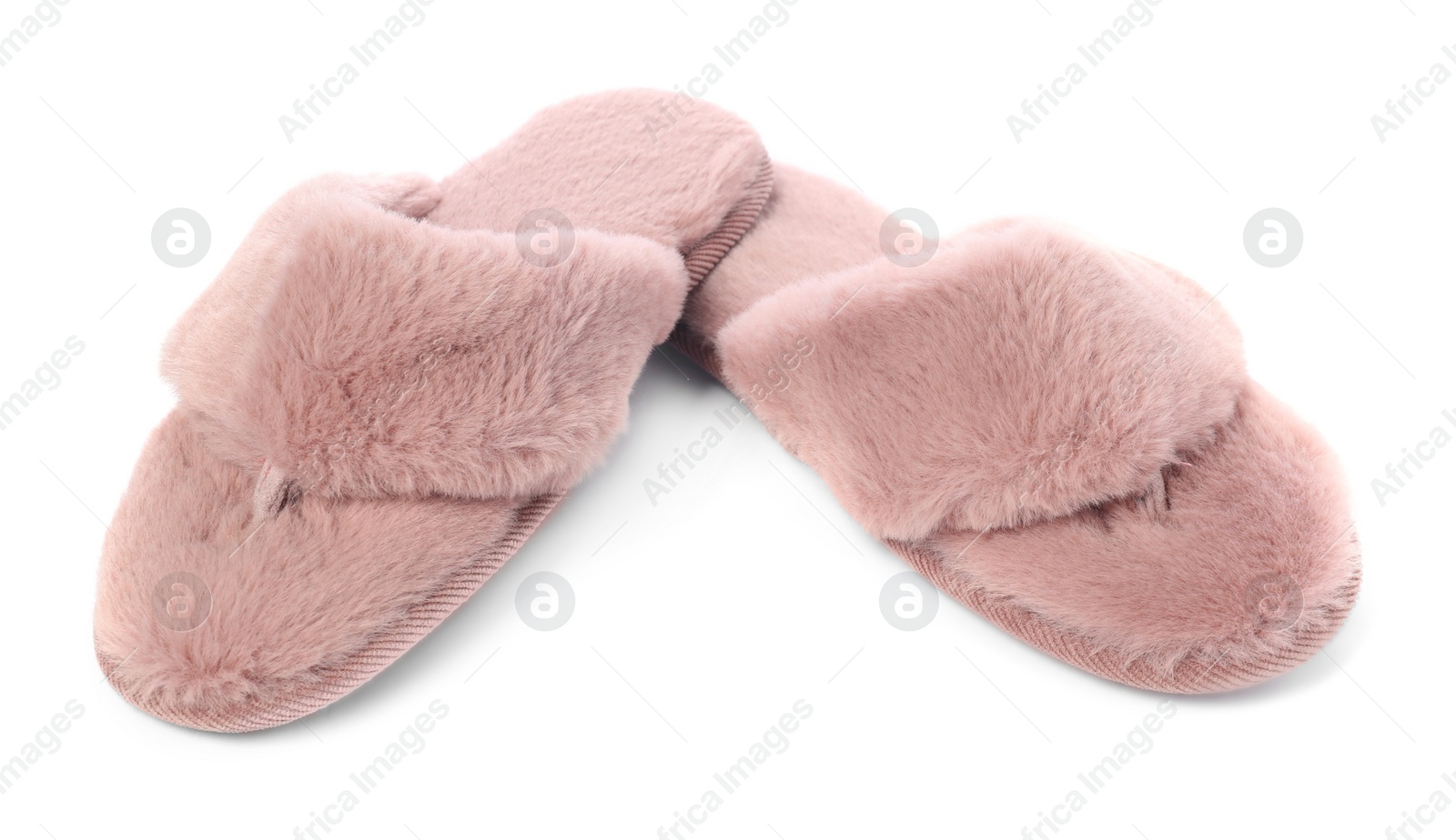 Photo of Pair of pink soft slippers isolated on white