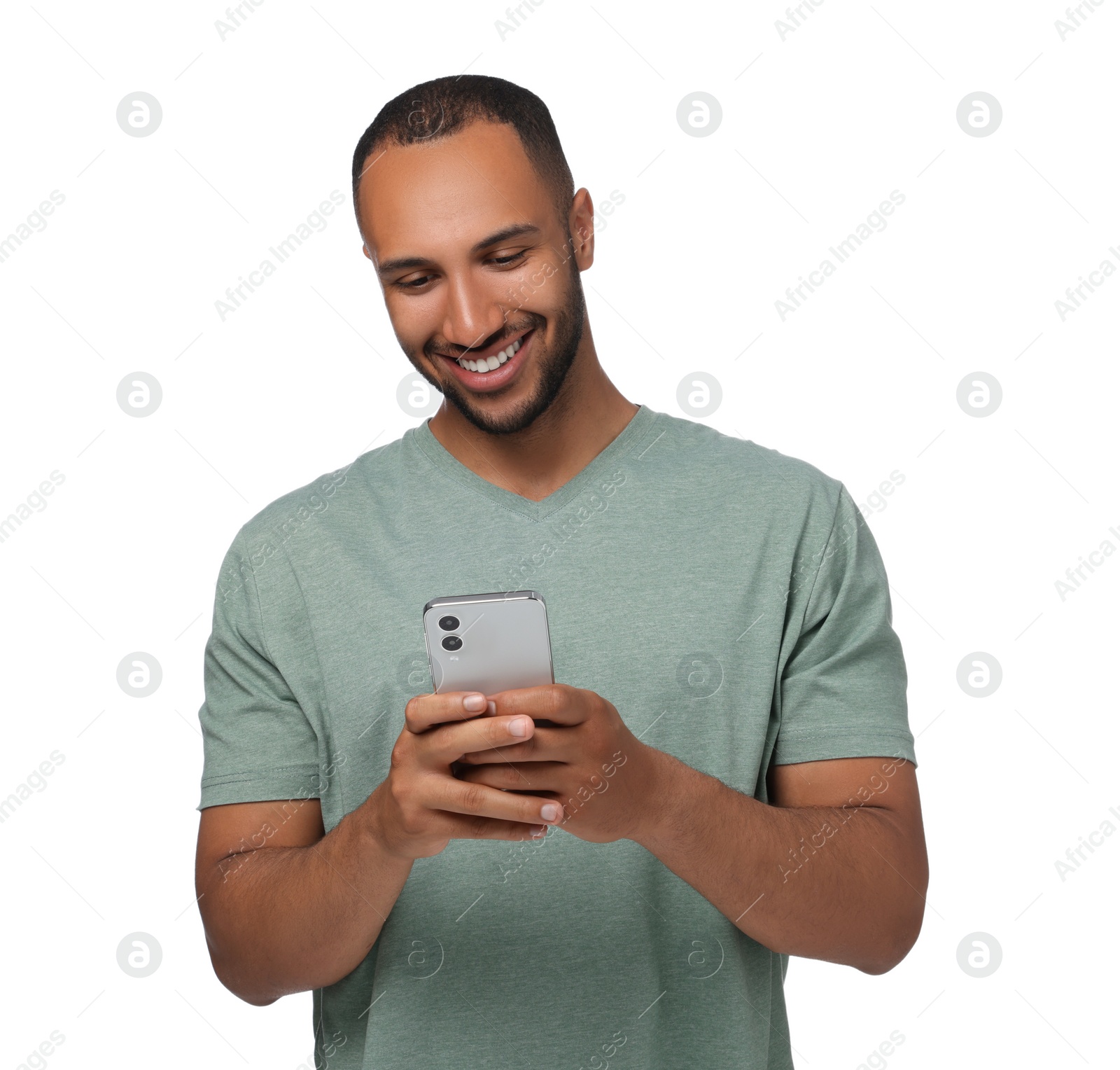 Photo of Happy man sending message via smartphone on white background