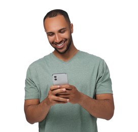 Happy man sending message via smartphone on white background