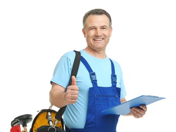 Photo of Mature plumber with clipboard and tool bag on white background