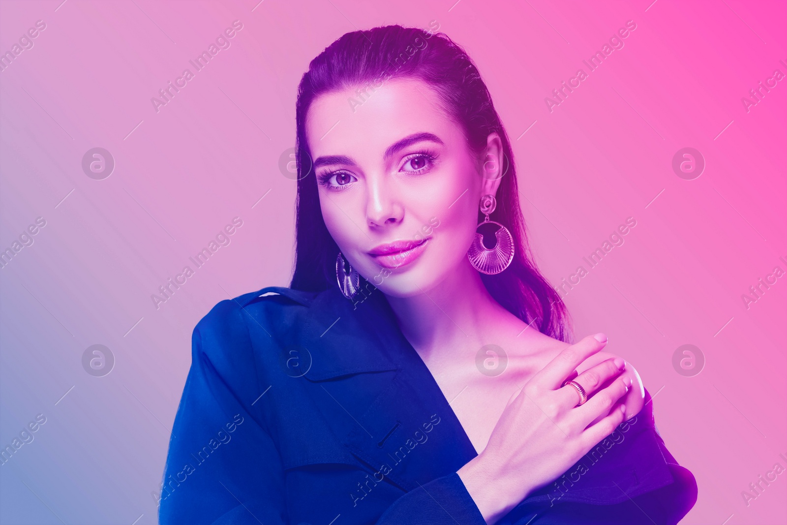 Image of Portrait of beautiful woman in neon lights