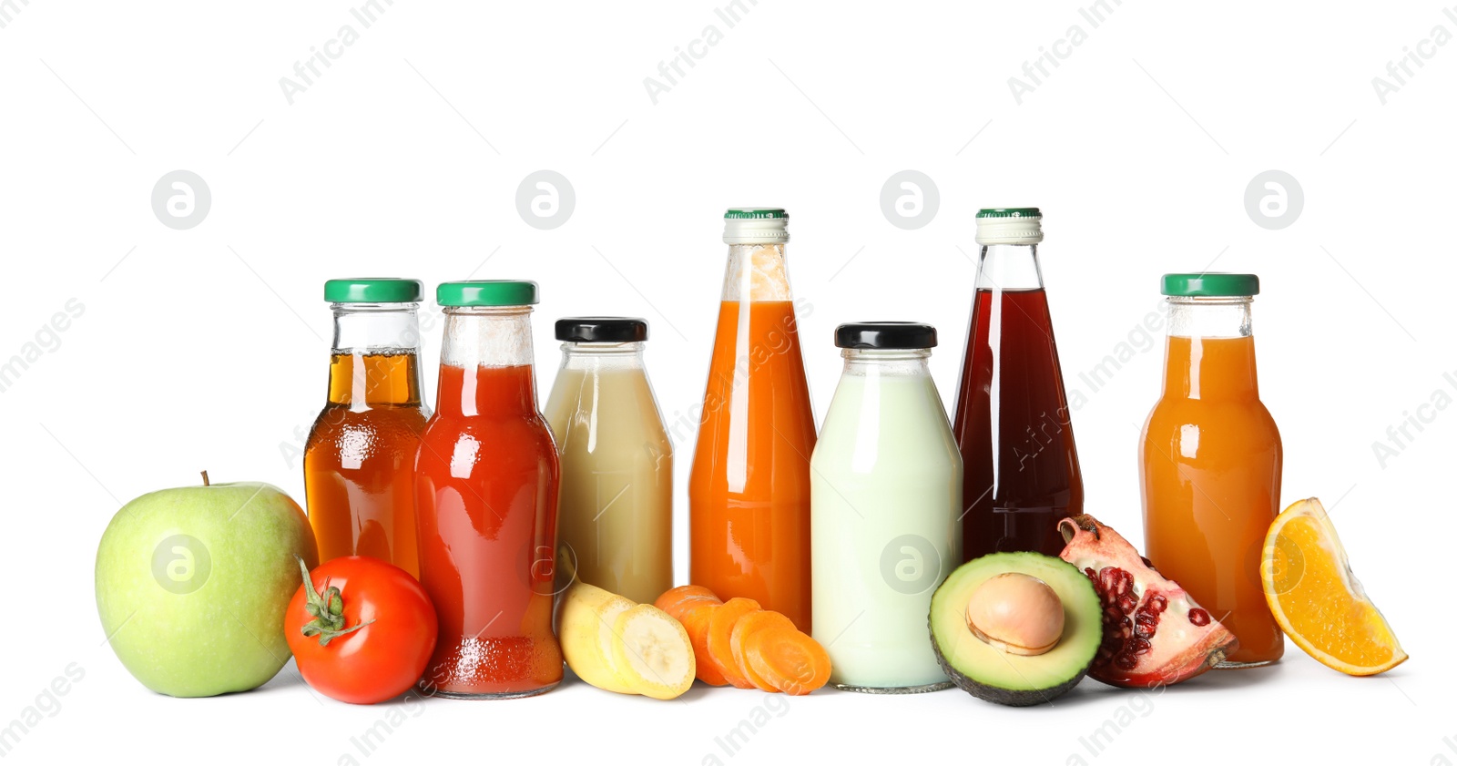 Photo of Bottles with different drinks and ingredients on white background