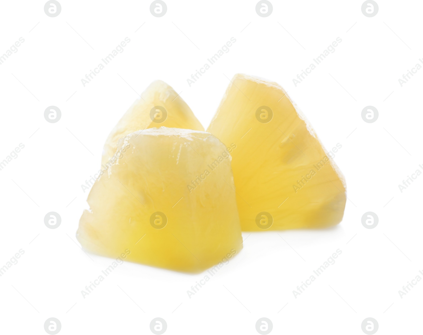 Photo of Pieces of canned pineapple isolated on white