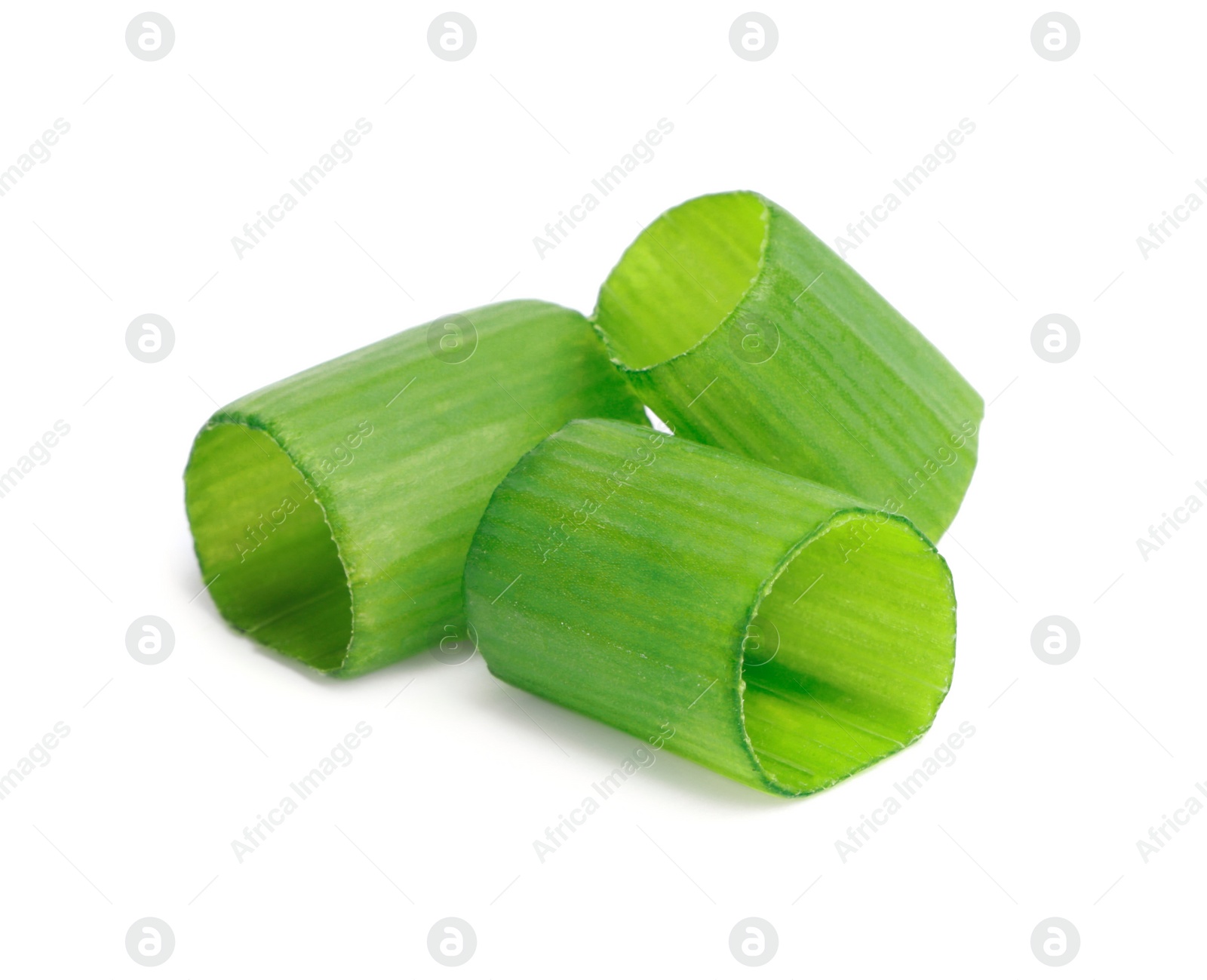 Photo of Pieces of fresh green onion on white background