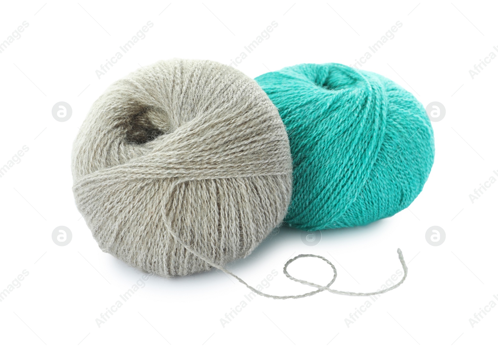 Photo of Soft colorful woolen yarns on white background