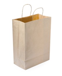 Photo of Kraft shopping paper bag isolated on white