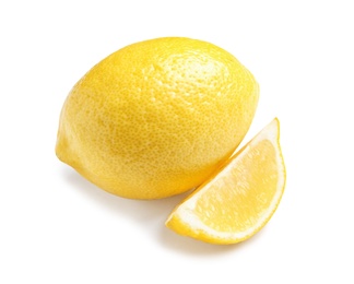 Photo of Ripe whole and sliced lemons on white background