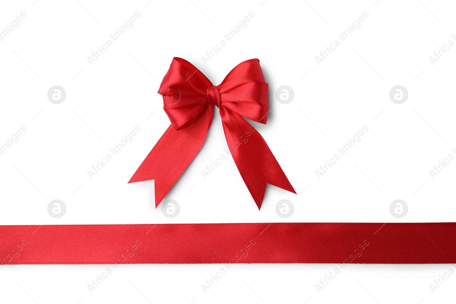 Photo of Red satin ribbon with bow isolated on white, top view