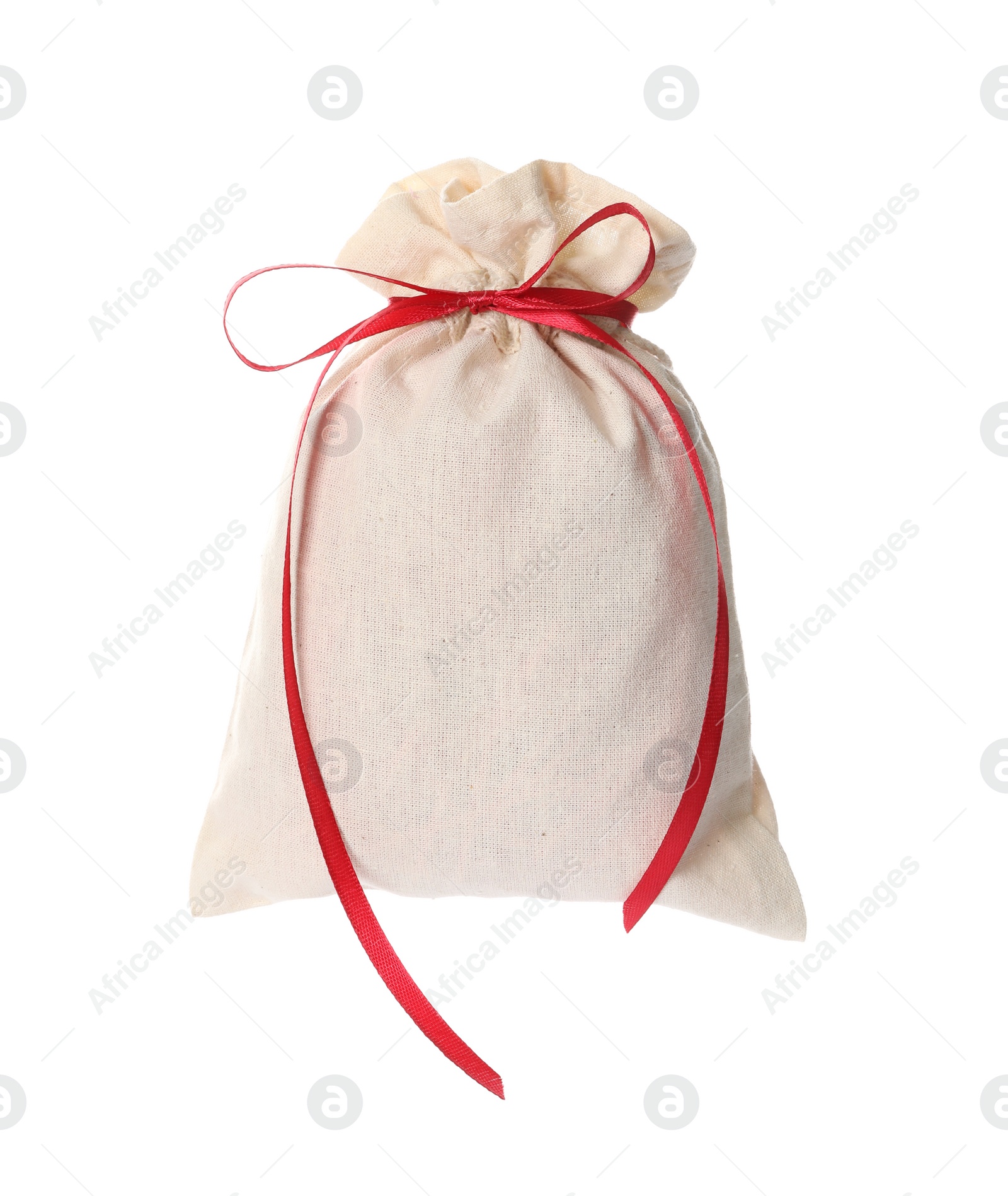 Photo of Small bag with red ribbon isolated on white. Christmas advent calendar