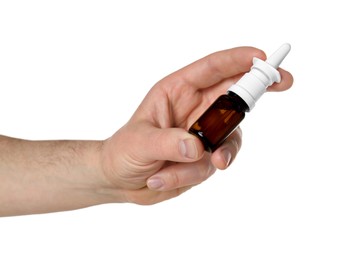 Photo of Man holding nasal spray on white background, closeup