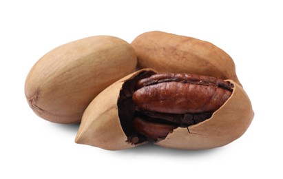 Photo of Three tasty pecan nuts isolated on white