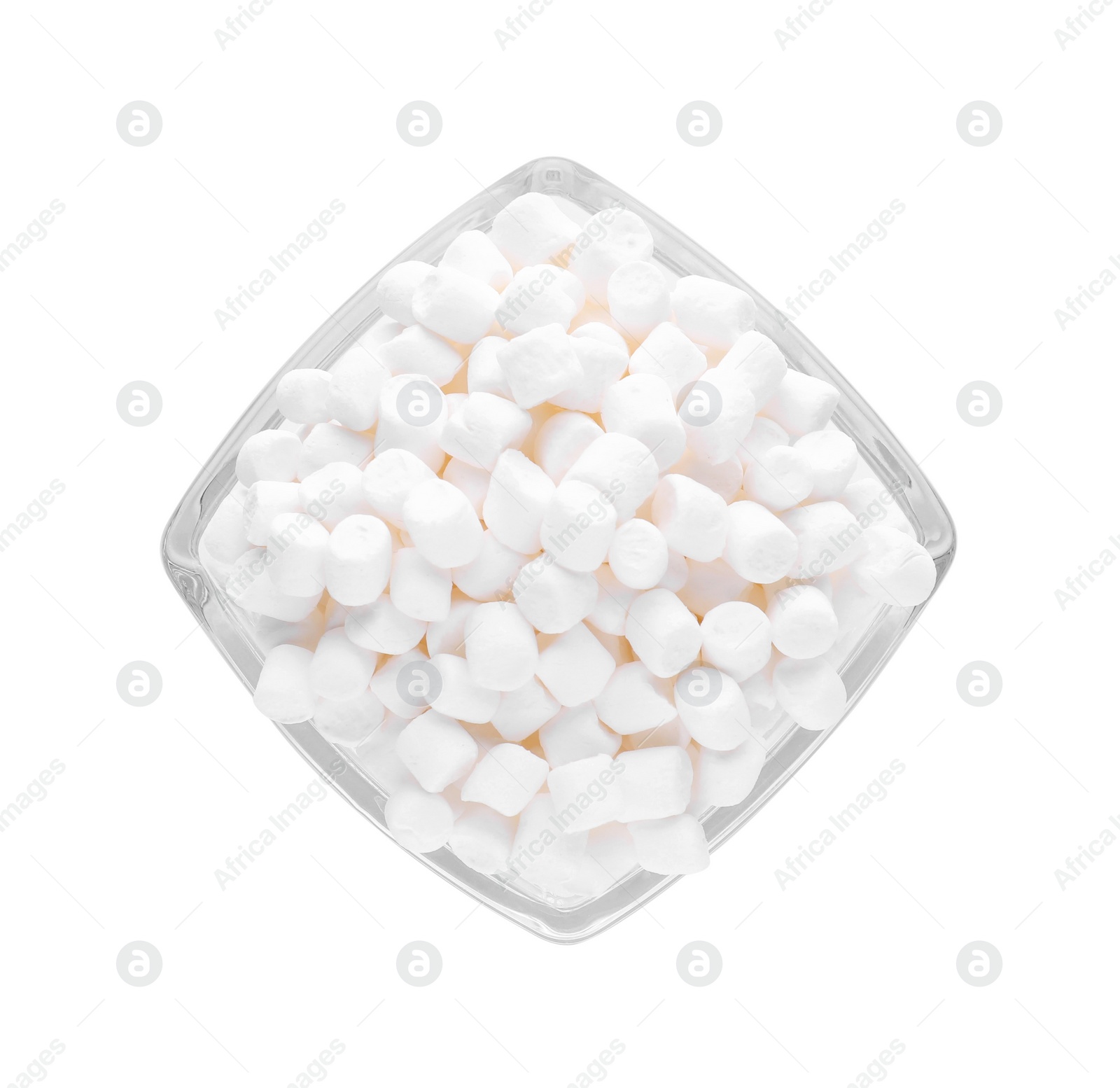 Photo of Bowl of delicious puffy marshmallows isolated on white, top view