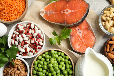 Photo of Products rich in protein on table, flat lay