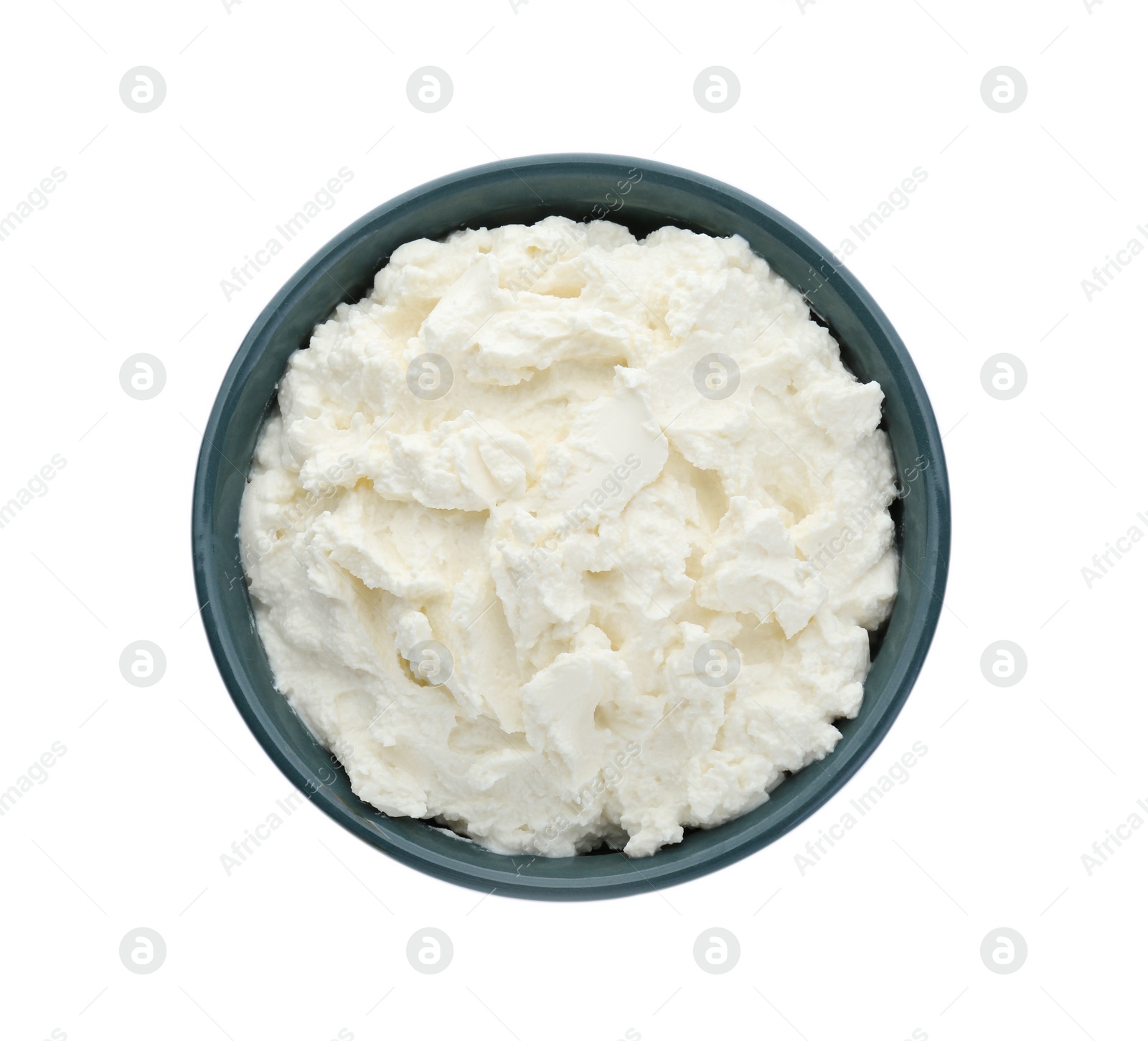 Photo of Delicious tofu cream cheese in bowl isolated on white, top view