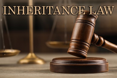 Image of Phrase Inheritance law and wooden gavel on table, closeup