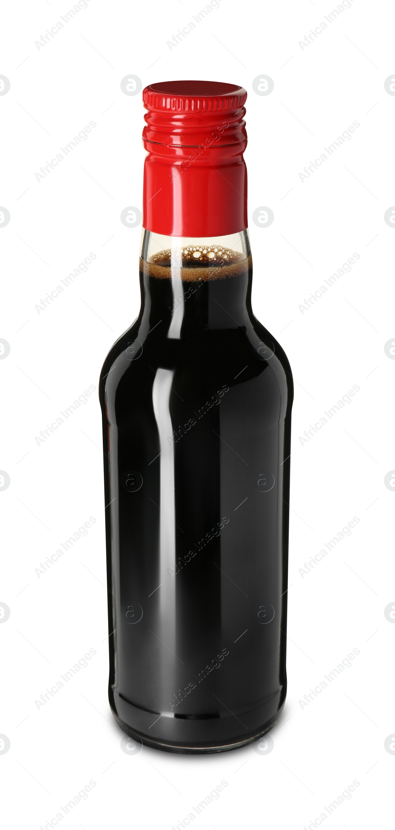 Photo of Tasty soy sauce in bottle isolated on white
