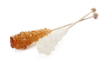 Photo of Wooden stick with sugar crystals isolated on white. Tasty rock candy