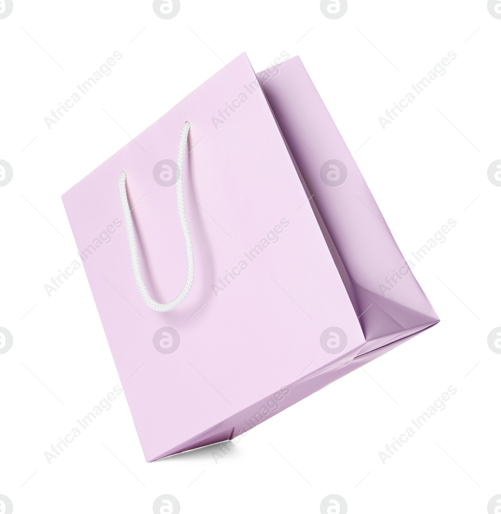 Photo of One paper shopping bag isolated on white