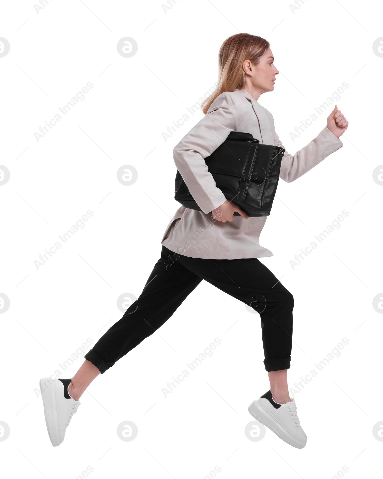 Photo of Beautiful businesswoman with briefcase running on white background