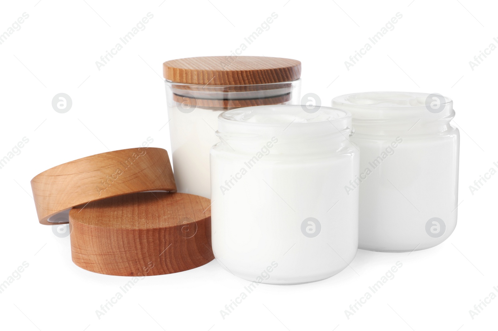 Photo of Jars of face cream isolated on white