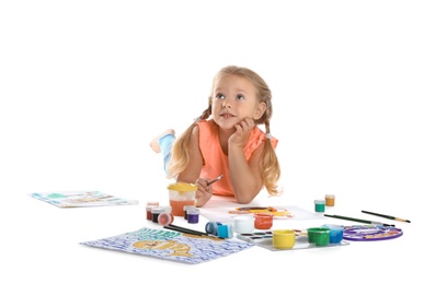 Photo of Cute child painting picture on white background