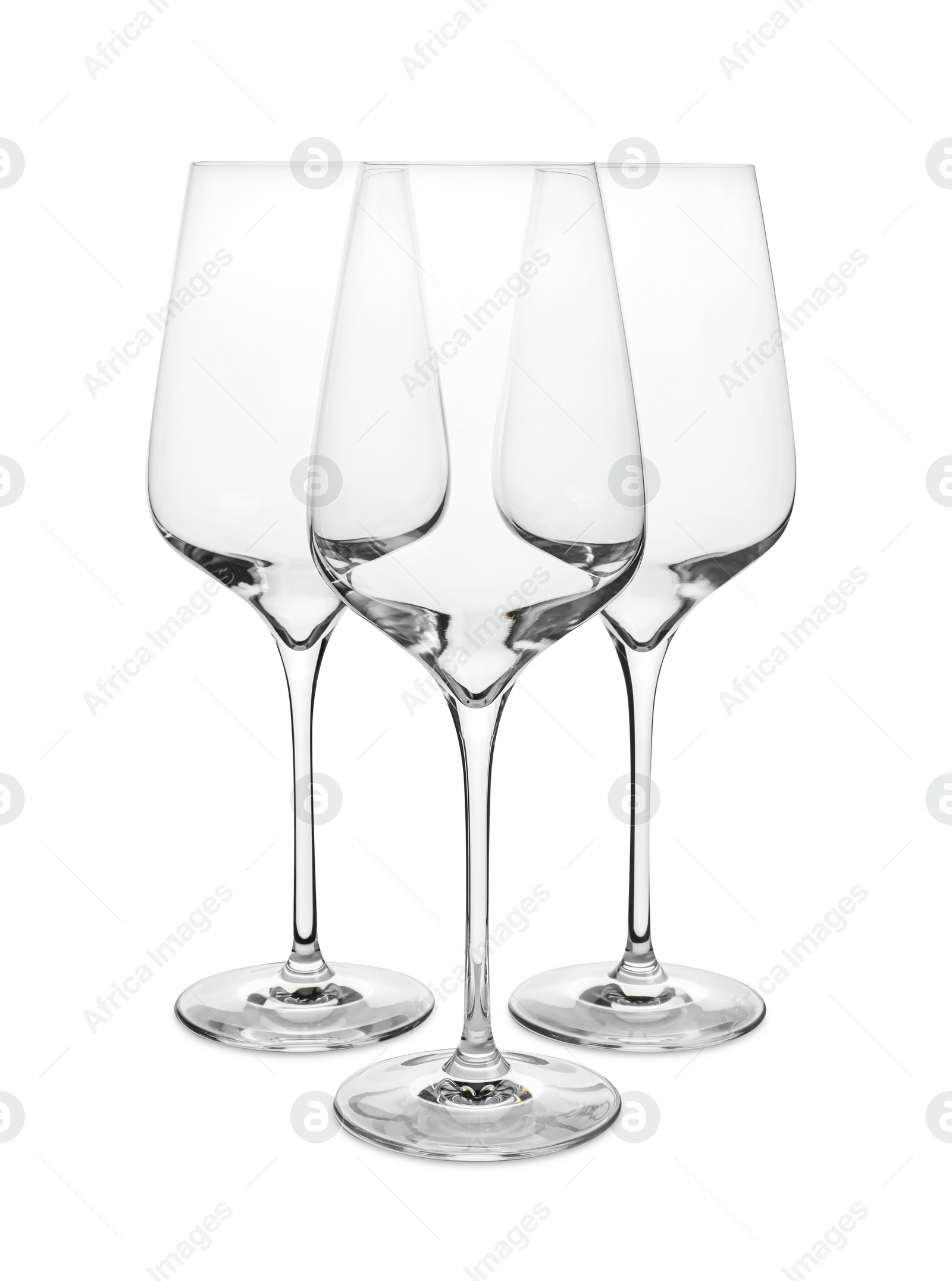 Photo of Elegant clean empty wine glasses isolated on white