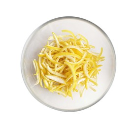 Photo of Glass bowl of fresh lemon peel isolated on white, top view. Citrus zest