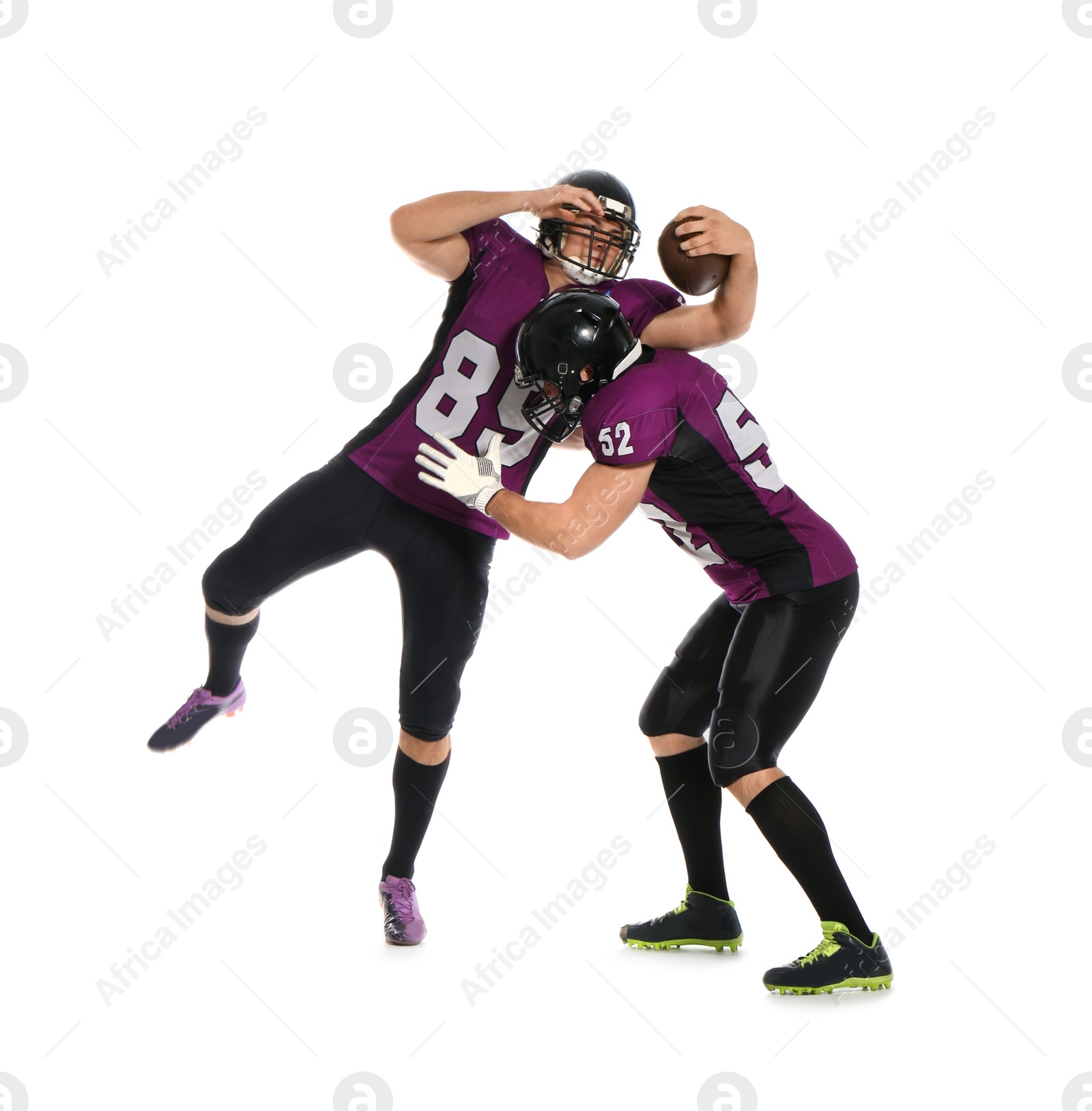 Photo of Men in uniform playing American football on white background