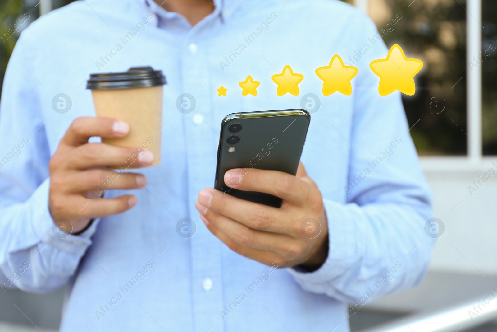 Image of Man with smartphone giving feedback outdoors, closeup. Customer review