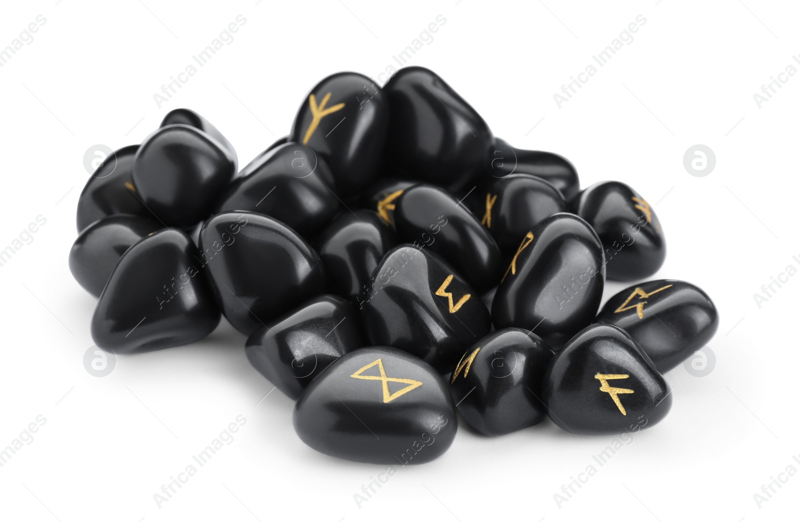 Photo of Pile of black rune stones isolated on white